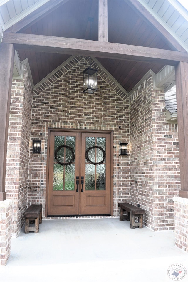 property entrance featuring french doors