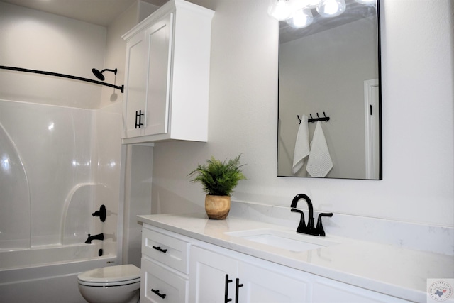 full bathroom with tub / shower combination, toilet, and vanity