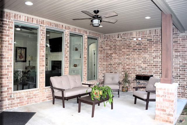 view of patio featuring an outdoor living space and ceiling fan