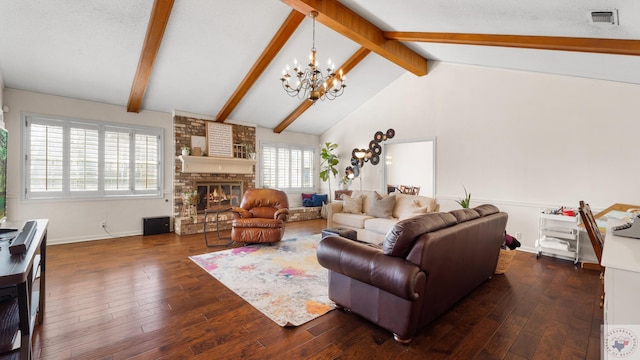 living room featuring dark wood finished floors, beamed ceiling, and a fireplace