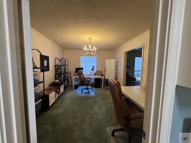 carpeted office with a textured ceiling, a notable chandelier, and ornamental molding