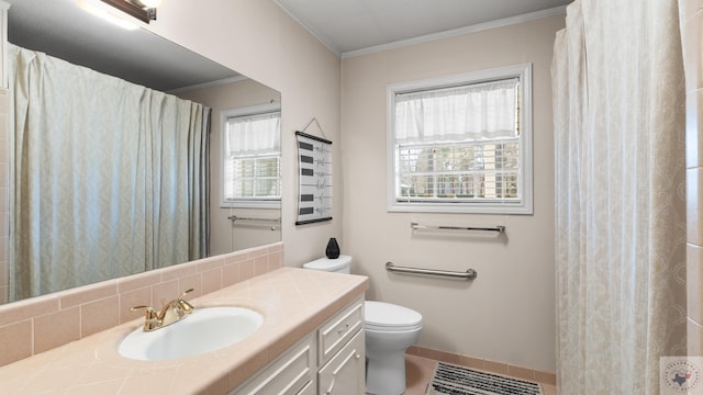 full bath featuring tile patterned floors, toilet, crown molding, baseboards, and vanity