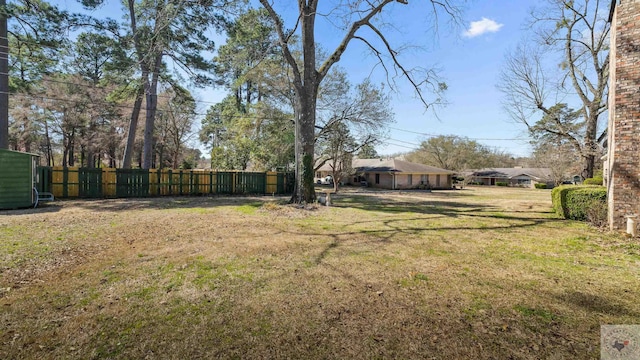 view of yard featuring fence