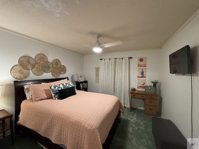 carpeted bedroom with a textured ceiling, ceiling fan, and ornamental molding