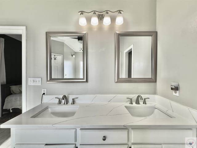full bath with double vanity and a sink