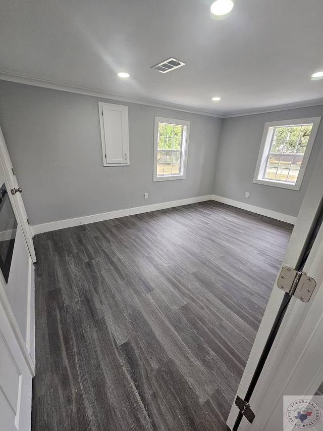 spare room featuring ornamental molding