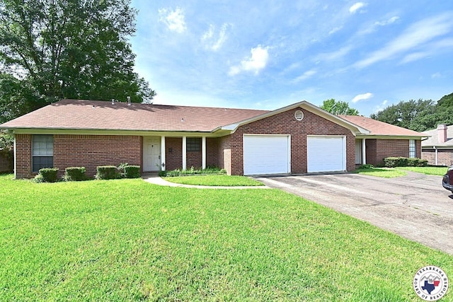 1104A E 23rd St, Texarkana, AR 71854 - single story home featuring an attached garage, asphalt driveway, a front lawn, and brick siding