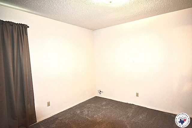 1104A E 23rd St, Texarkana, AR 71854 - carpeted spare room with a textured ceiling