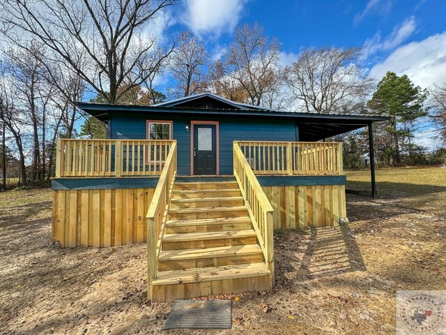 view of front facade featuring a deck