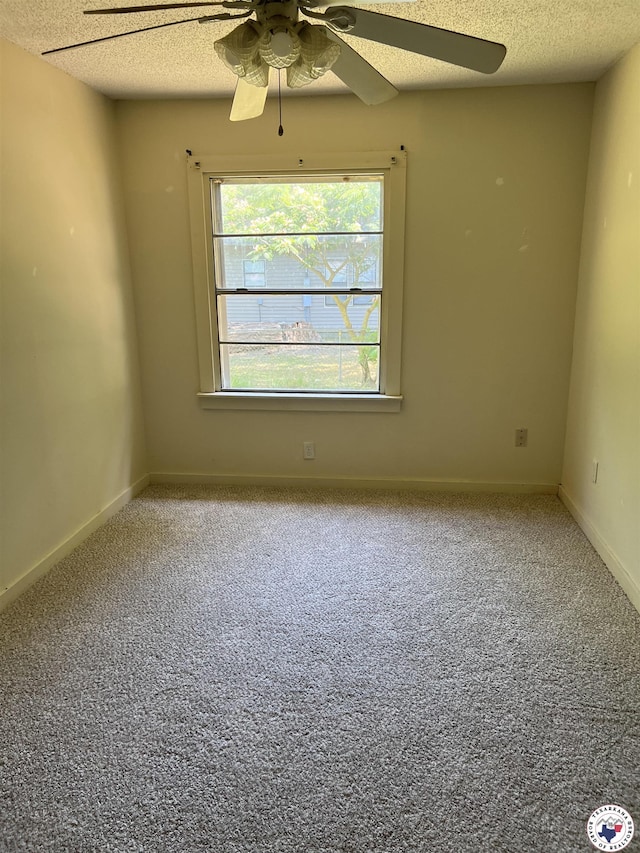 319 Crestview Rd, Texarkana, TX 75501 - spare room with ceiling fan, carpet, a textured ceiling, and baseboards