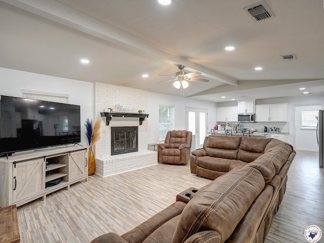 43 Broadmoor Dr, Texarkana, AR 78154 - living area featuring a ceiling fan, light wood finished floors, a brick fireplace, and recessed lighting