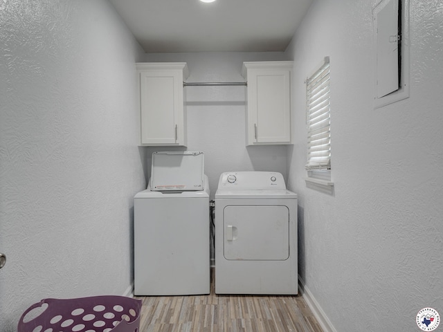 43 Broadmoor Dr, Texarkana, AR 78154 - washroom with independent washer and dryer, cabinet space, light wood-type flooring, and a textured wall