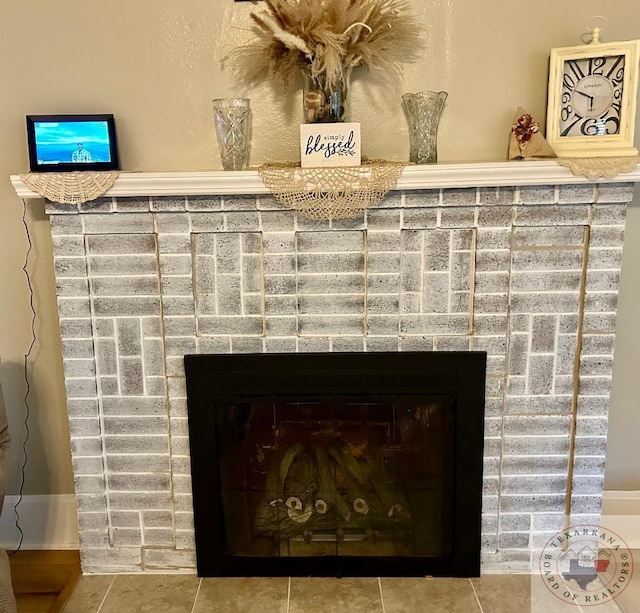 details featuring a brick fireplace