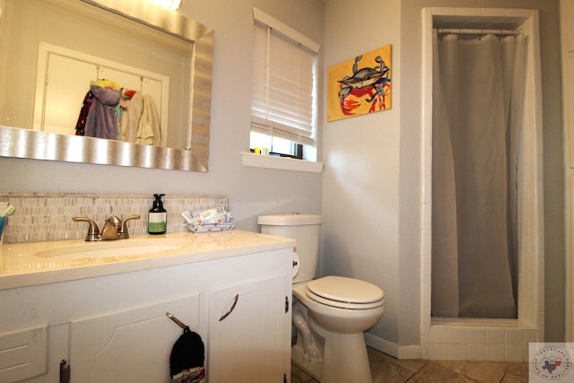 bathroom with tile patterned floors, backsplash, a shower with curtain, toilet, and vanity