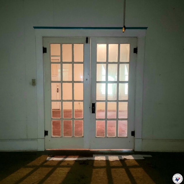 607 N Walnut St, Clarksville, TX 75426 - doorway to outside featuring french doors