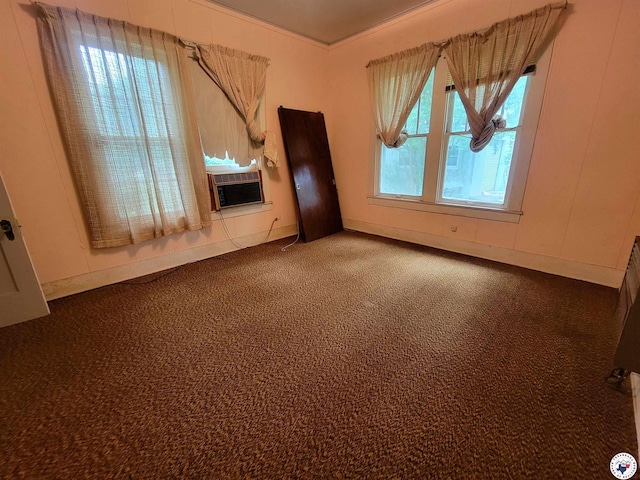 607 N Walnut St, Clarksville, TX 75426 - spare room with carpet floors, cooling unit, and baseboards