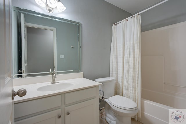 full bathroom featuring toilet, vanity, and shower / bath combo