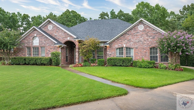 view of front of property with a front lawn