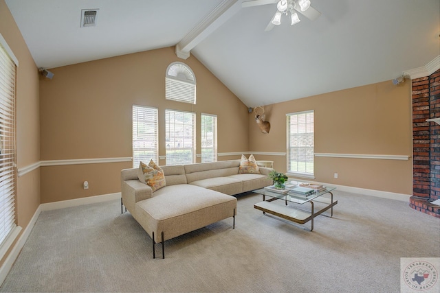 carpeted living room with ceiling fan and lofted ceiling with beams