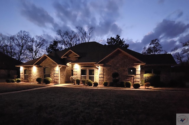 view of front of property featuring stone siding