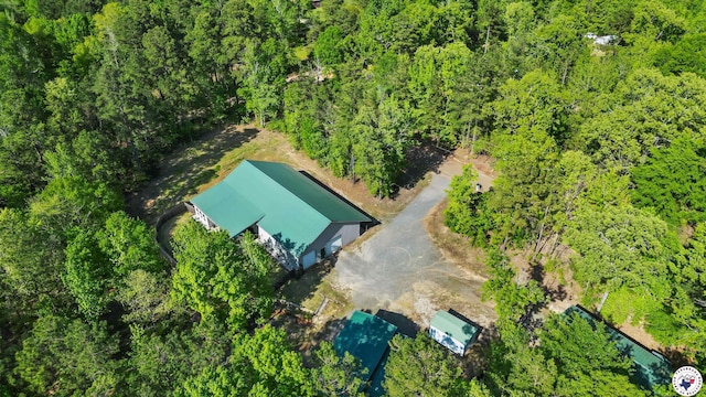 bird's eye view featuring a forest view