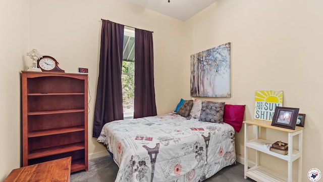 bedroom featuring baseboards