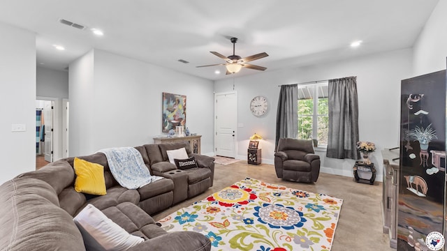 living room featuring baseboards, a ceiling fan, visible vents, and recessed lighting