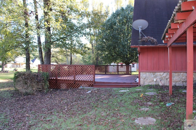 view of yard with a deck