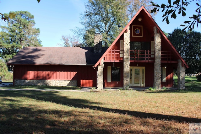 exterior space featuring a deck and a lawn