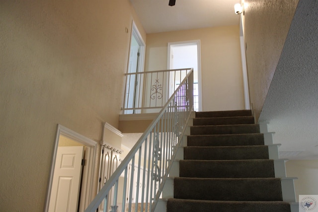 stairs with a towering ceiling