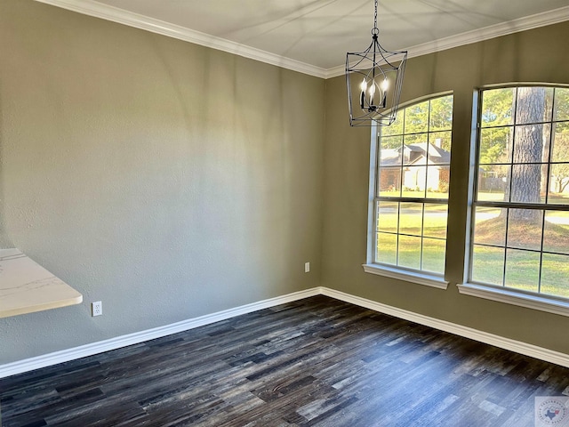 unfurnished dining area with ornamental molding, an inviting chandelier, and dark hardwood / wood-style flooring