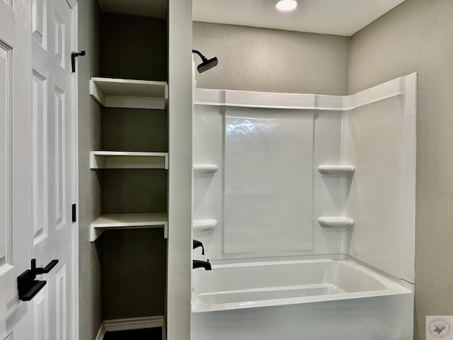 bathroom featuring washtub / shower combination