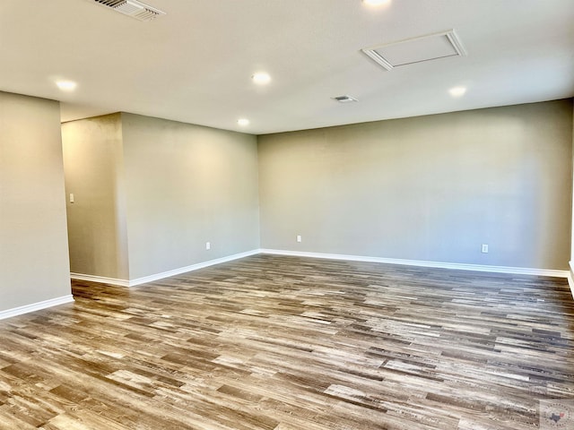 unfurnished room featuring wood-type flooring