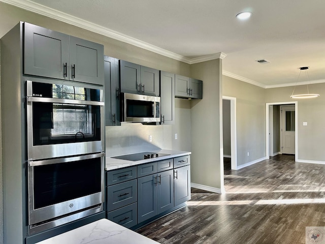 kitchen with crown molding, hanging light fixtures, gray cabinetry, stainless steel appliances, and dark hardwood / wood-style floors