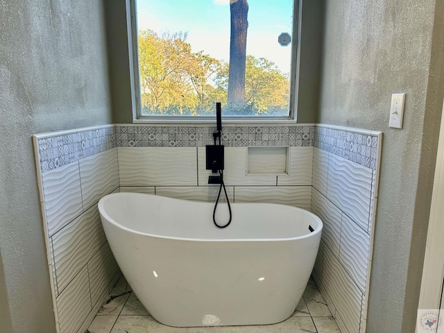 bathroom featuring a bathtub