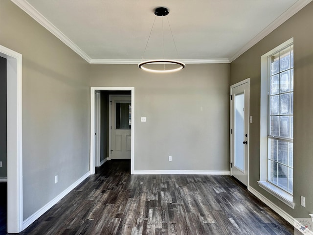 unfurnished dining area with a healthy amount of sunlight, ornamental molding, and dark hardwood / wood-style flooring