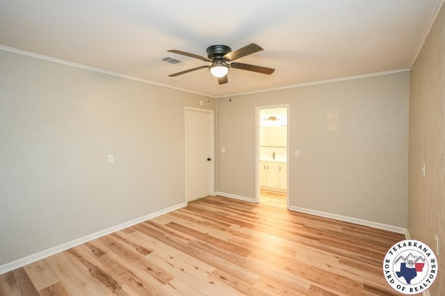 unfurnished room with crown molding, a ceiling fan, baseboards, light wood-type flooring, and visible vents