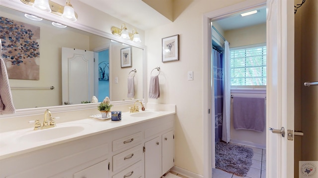 bathroom with vanity and tile patterned floors