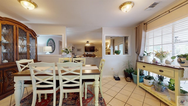 dining space with light tile patterned floors