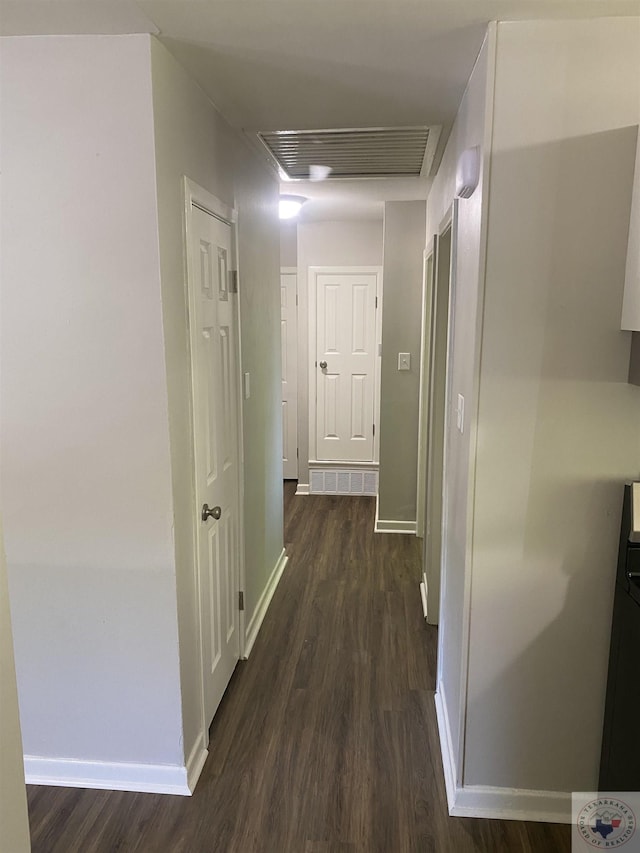 hall featuring dark hardwood / wood-style flooring