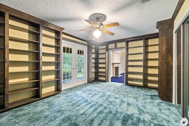 803 Lakeridge Pl, Texarkana, TX 75503 - unfurnished bedroom with french doors, carpet, ornamental molding, a textured ceiling, and access to exterior