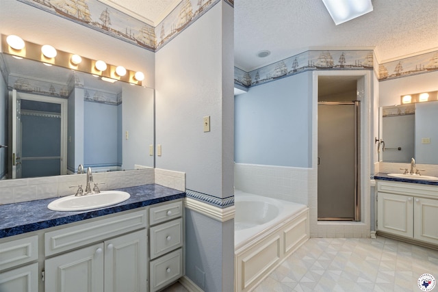 803 Lakeridge Pl, Texarkana, TX 75503 - bathroom with a stall shower, a garden tub, two vanities, a textured ceiling, and tile patterned floors