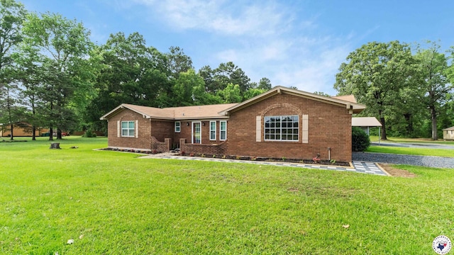 8809 N Kings Hwy, Texarkana, TX 75503 - ranch-style home featuring a front yard and brick siding