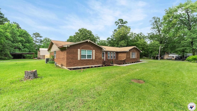 8809 N Kings Hwy, Texarkana, TX 75503 - ranch-style home featuring a front yard and brick siding