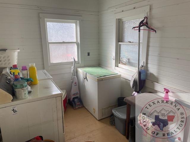 laundry area featuring washing machine and dryer