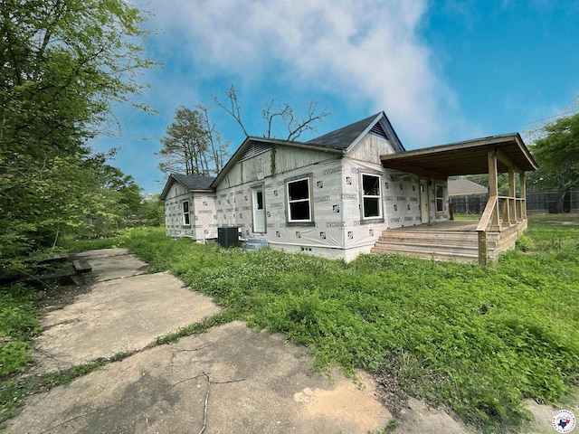 exterior space featuring central AC and crawl space