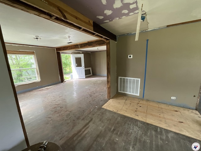 spare room featuring visible vents