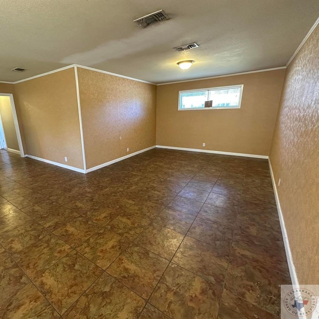 empty room featuring ornamental molding