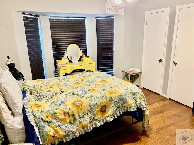 bedroom featuring hardwood / wood-style flooring