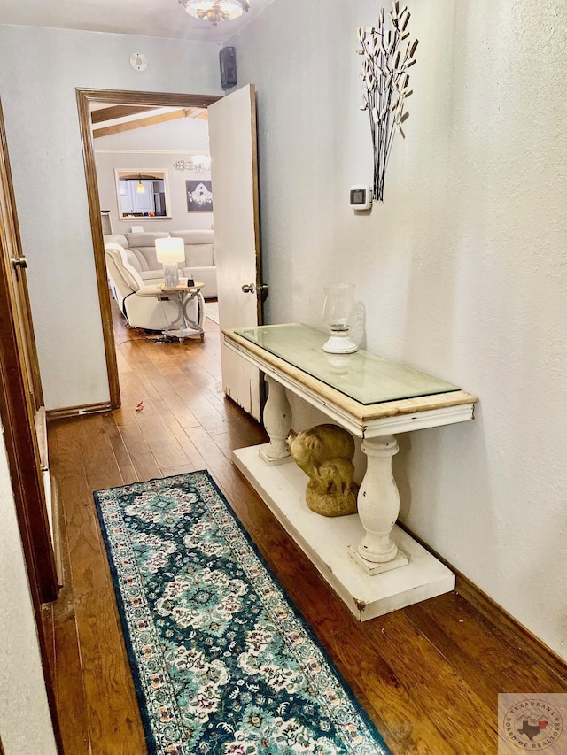 hallway featuring hardwood / wood-style flooring